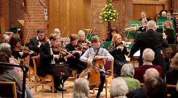 Picture of soloist Daniel Schultz with SPO. Photo &copy; 2025 by Andrew Carter